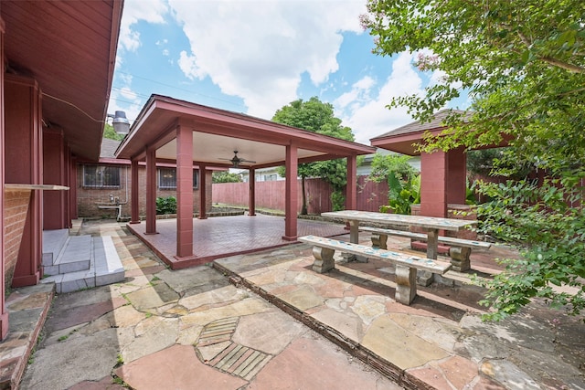 view of patio / terrace featuring ceiling fan