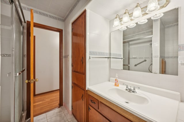 bathroom featuring vanity and tile patterned flooring