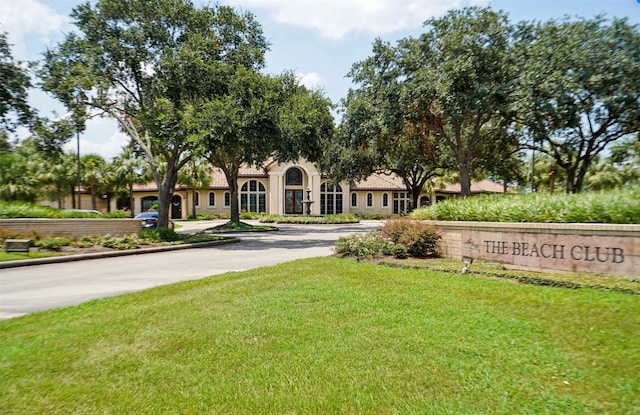 view of community with a lawn