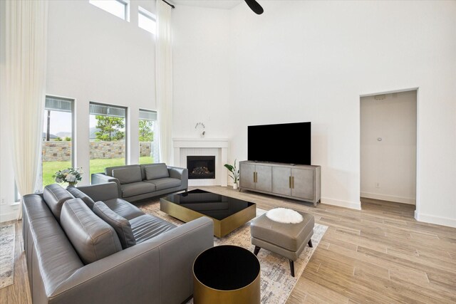 living room with a towering ceiling