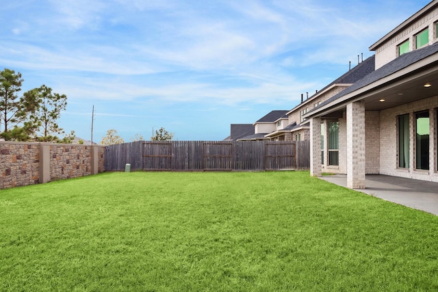 view of yard with a patio area