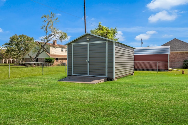 view of outdoor structure with a yard