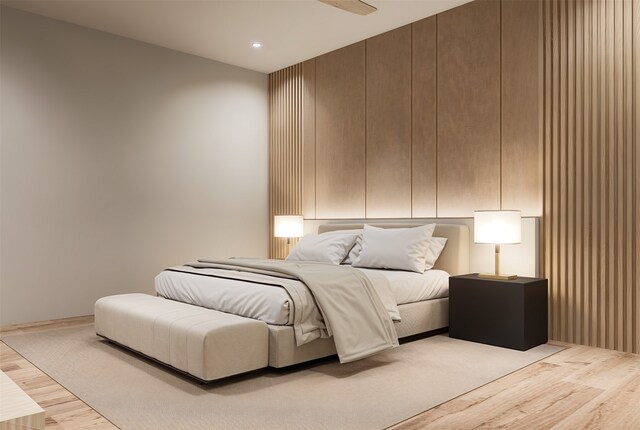 bedroom with light hardwood / wood-style flooring