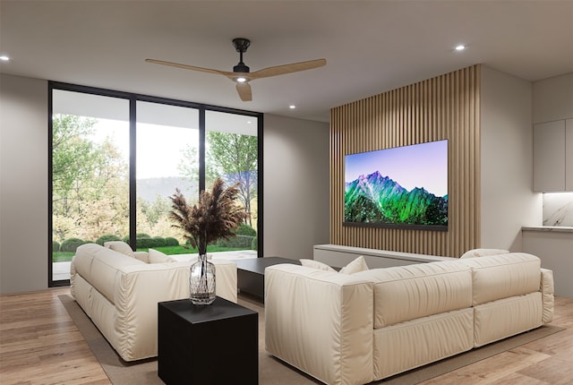 cinema featuring recessed lighting, light wood-type flooring, and a ceiling fan