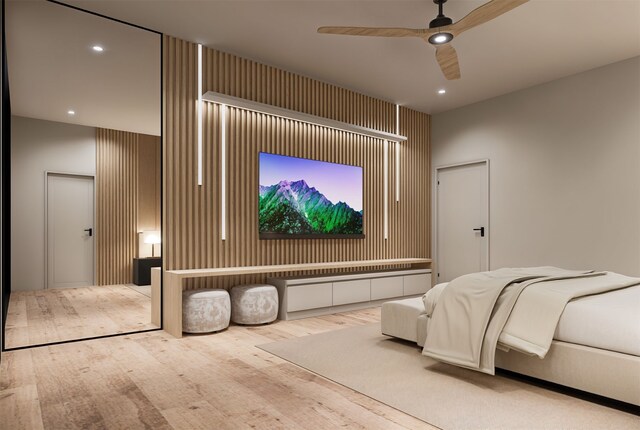 home theater with hardwood / wood-style flooring and ceiling fan