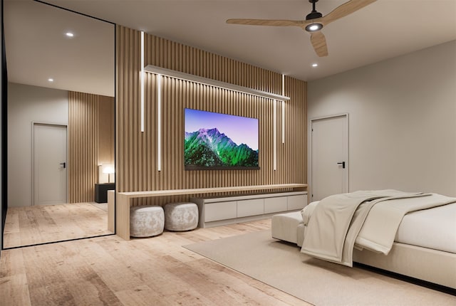 cinema room with recessed lighting, wood finished floors, and a ceiling fan