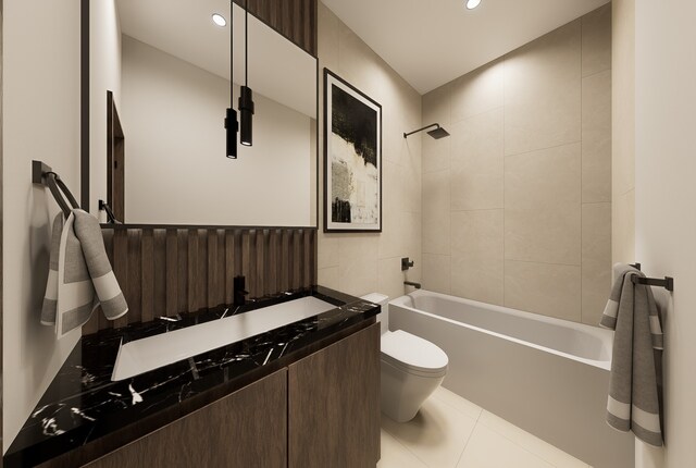 full bathroom with tile patterned flooring, vanity, toilet, and tiled shower / bath