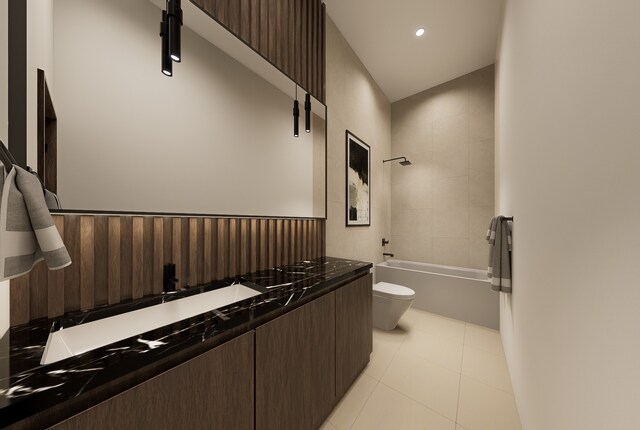 full bathroom featuring tile patterned floors, vanity, toilet, and tiled shower / bath