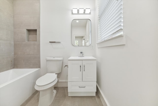 full bathroom featuring vanity, toilet, tile patterned flooring, and tub / shower combination