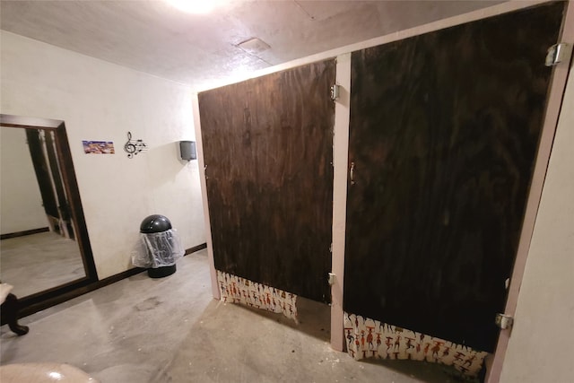 bathroom with concrete floors