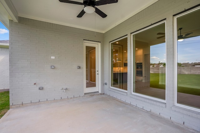 view of patio / terrace featuring ceiling fan