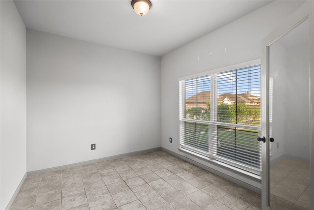 view of tiled spare room