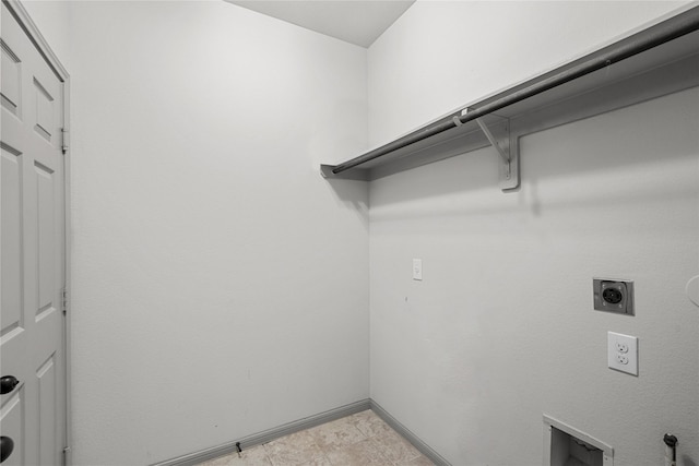 laundry room featuring baseboards, laundry area, and hookup for an electric dryer