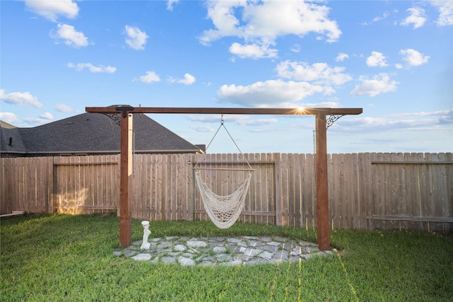 view of yard with a fenced backyard