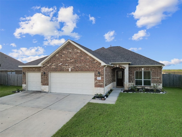 ranch-style house with a garage and a front yard