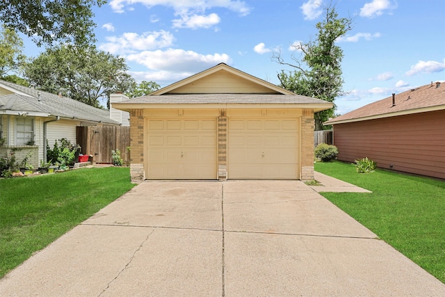 garage featuring a yard