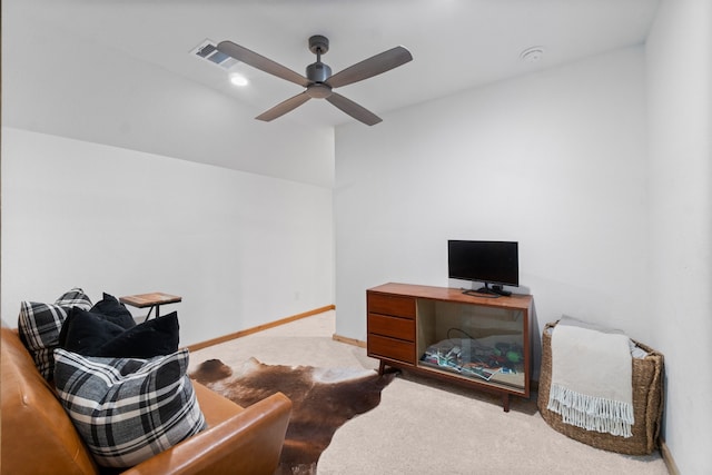 interior space featuring carpet flooring and ceiling fan