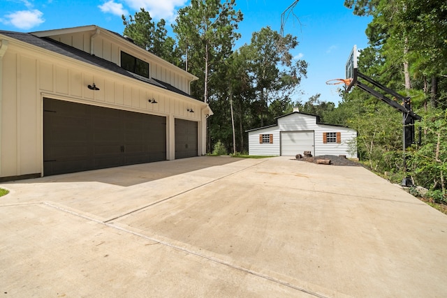 view of side of home featuring a garage