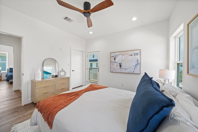 bedroom featuring light wood-type flooring and ceiling fan