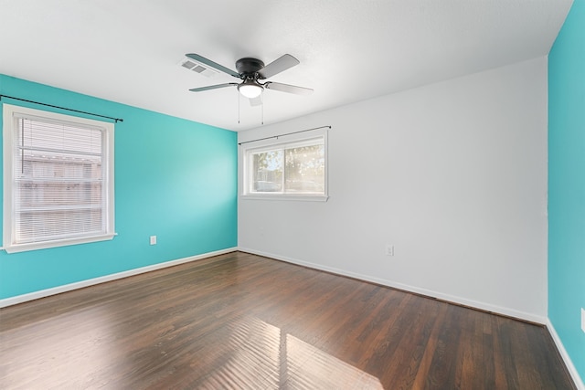 unfurnished room featuring ceiling fan and hardwood / wood-style floors