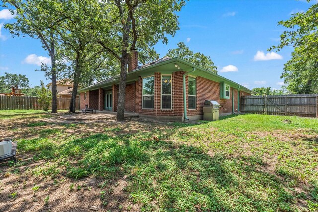 exterior space with a lawn