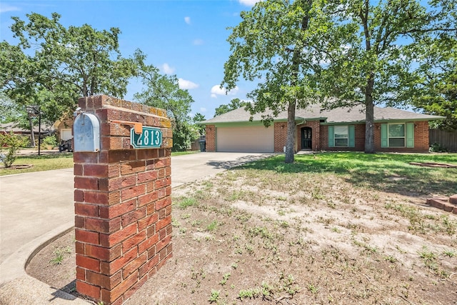 single story home featuring a garage