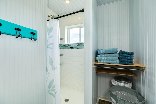 bathroom with a shower with curtain