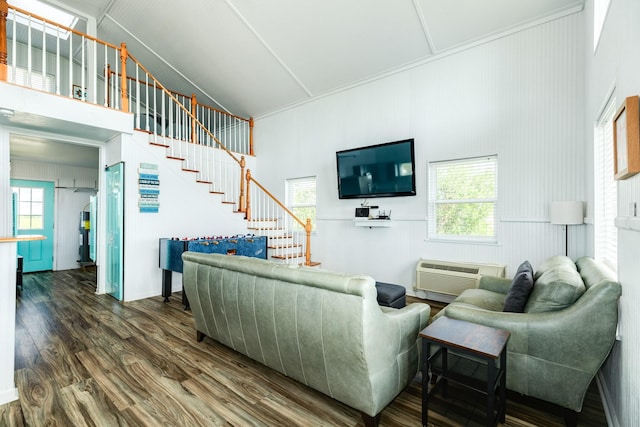 living room with high vaulted ceiling, dark wood-type flooring, and a wall unit AC