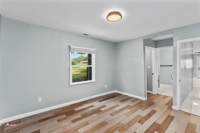 unfurnished bedroom with light hardwood / wood-style flooring