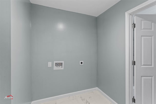 laundry area with electric dryer hookup, washer hookup, and light tile patterned floors