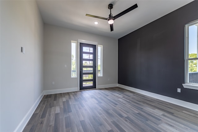 empty room featuring hardwood / wood-style floors and ceiling fan