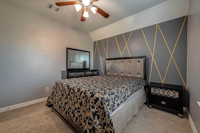 bedroom with lofted ceiling, light carpet, and ceiling fan