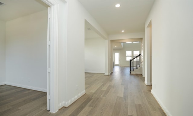 hallway featuring hardwood / wood-style flooring