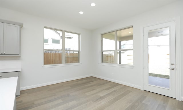 interior space with light hardwood / wood-style floors