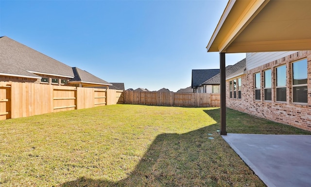 view of yard with a patio area