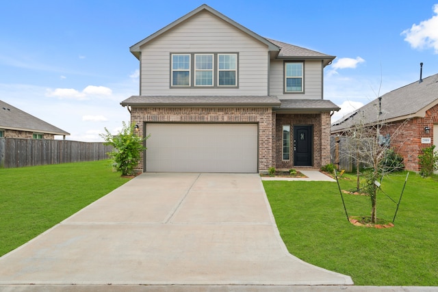 front of property with a garage and a front lawn