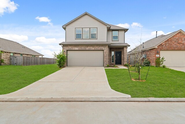 front facade with a front lawn and a garage