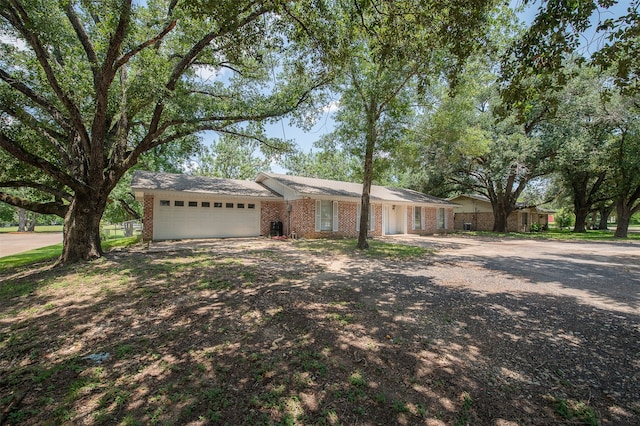 ranch-style home with a garage