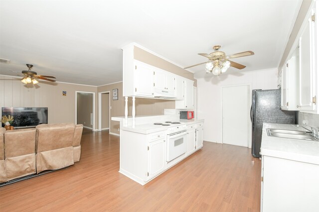 kitchen featuring ceiling fan, sink, light hardwood / wood-style flooring, and white cabinets