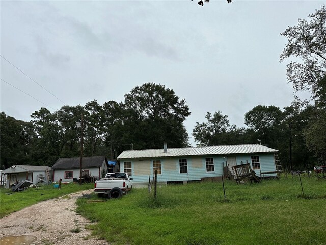 exterior space featuring a yard