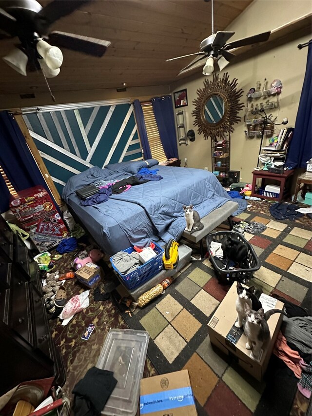 bedroom featuring tile patterned floors, vaulted ceiling, wood ceiling, and ceiling fan