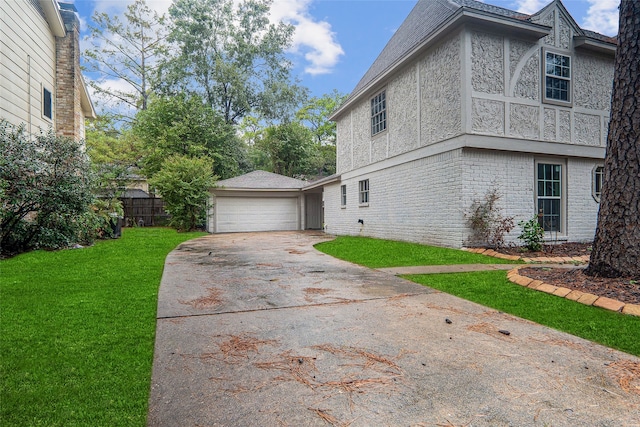 view of property exterior featuring a lawn