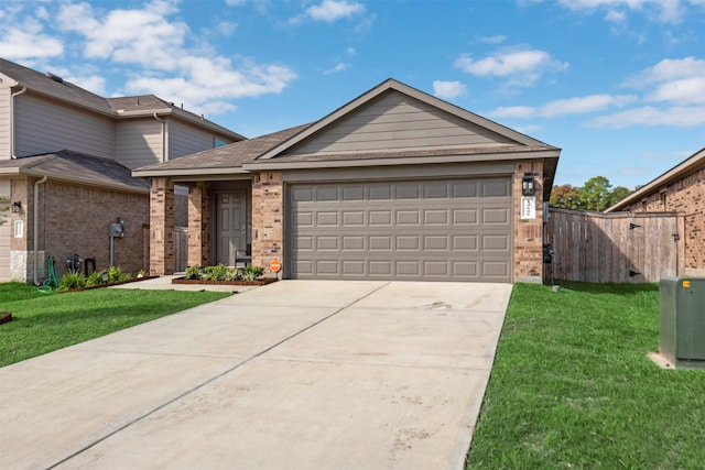 view of front facade featuring a garage and a front yard