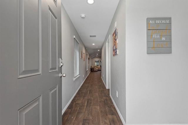 corridor with dark wood-type flooring