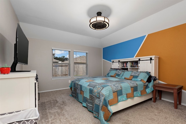 bedroom featuring light colored carpet