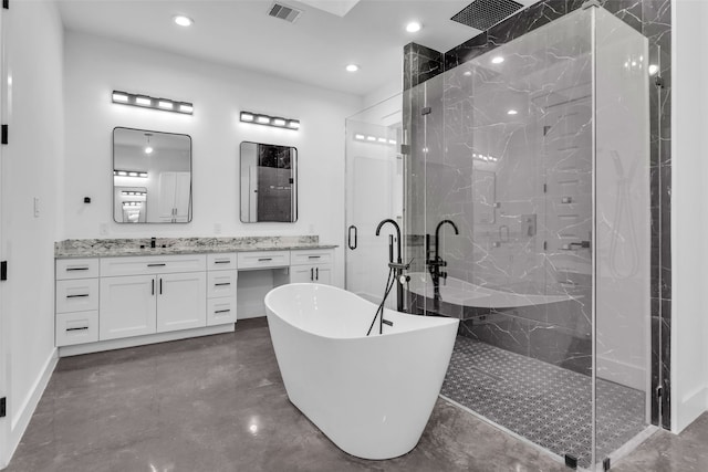 bathroom with vanity, concrete floors, and independent shower and bath