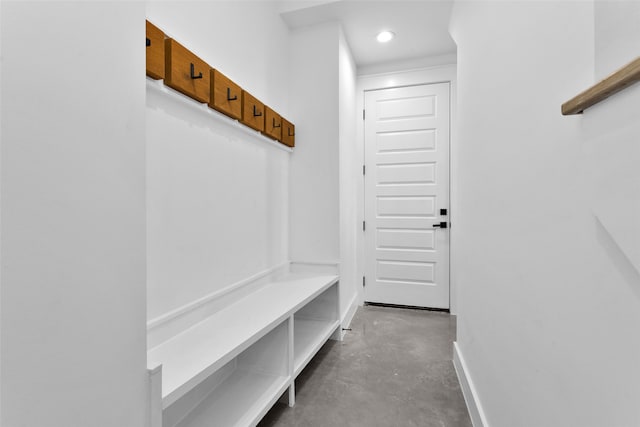 mudroom featuring concrete floors