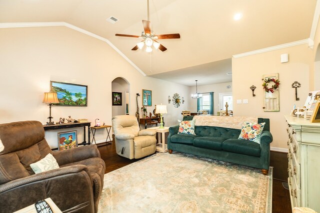 living room with hardwood / wood-style flooring, lofted ceiling, crown molding, and ceiling fan