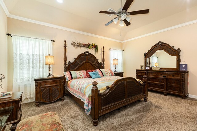 bedroom with carpet flooring, lofted ceiling, ceiling fan, and crown molding