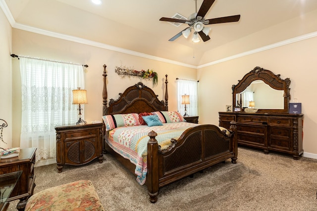 carpeted bedroom featuring crown molding, ceiling fan, and vaulted ceiling